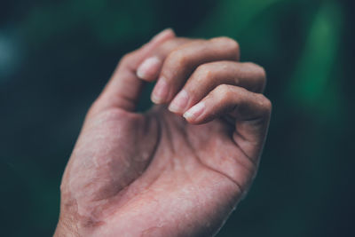 Close-up of hands on finger