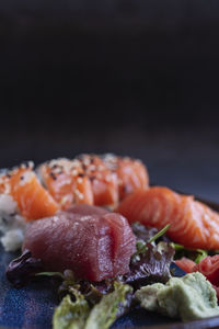 Eat sushi. delicious japanese cuisine, nigiri sushi with tuna served with wasabi and ginger