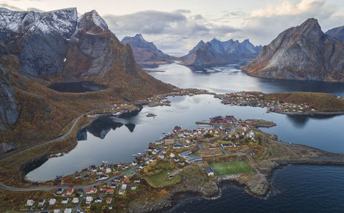 Scenic view of lake against cloudy sky