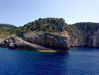 Scenic view of sea against clear sky