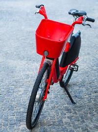 High angle view of bicycle parked on footpath