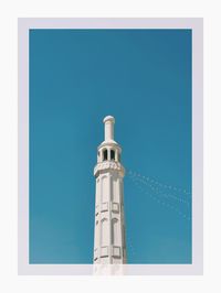 View of tower against blue sky