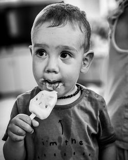 Portrait of boy eating ice cream