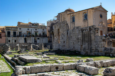 The ruins of the ancient temple of apollo, located in ortigia is a destination for many tourists.