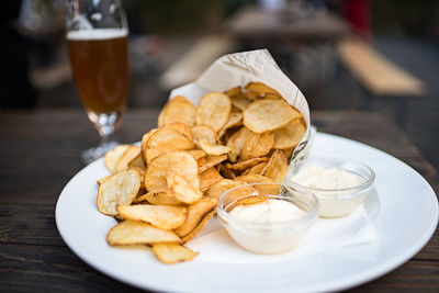 Close-up of beer in glass on table