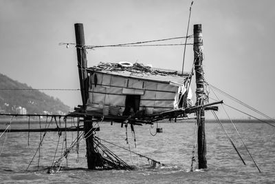 Sailboat on sea against sky