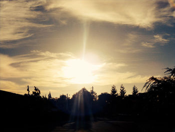 Sun shining through clouds