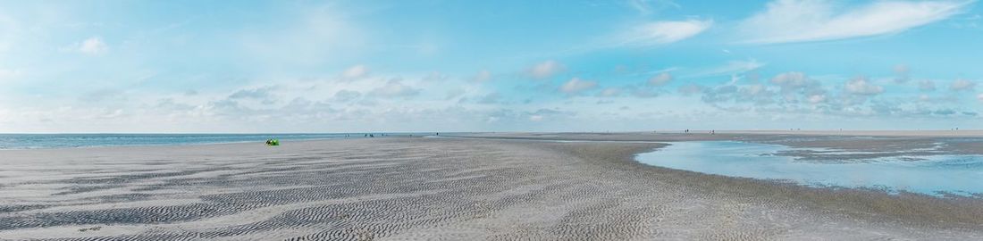 Panoramic view of beach against sky