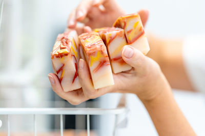 Close-up of woman holding ice cream