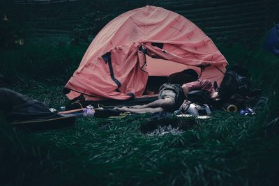 High angle view of people relaxing on field