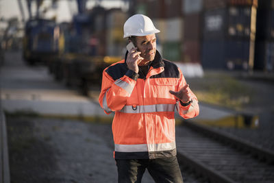 Man working on mobile phone