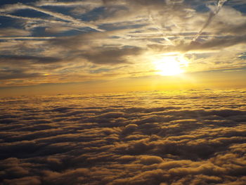 Sun shining through clouds