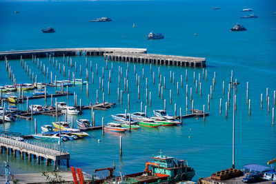 High angle view of boats moored at harbor