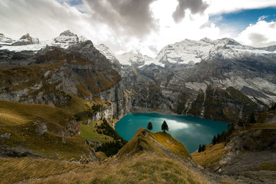 Scenic view of snowcapped mountains against sky