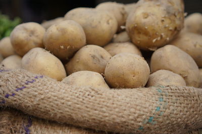 Close-up of potatoes in sack