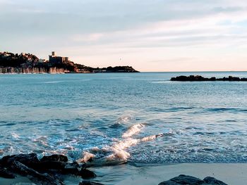 Scenic view of sea against sky during sunset