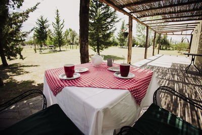 Empty chairs and tables in restaurant