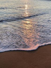 High angle view of surf on beach
