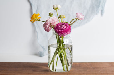 Close-up of flowers in vase on table