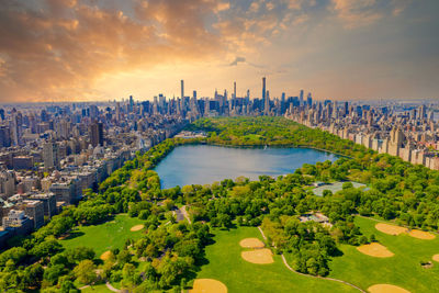 Central park aerial view, manhattan, new york. park is surrounded by skyscraper.