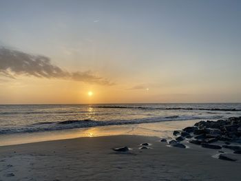 Scenic view of sea against sky during sunset