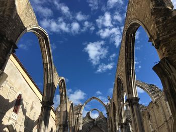 Low angle view of historical building against sky