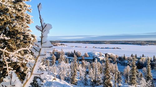 Scenic view of sea against clear sky during winter