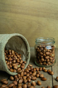 Close-up of peanut spilling on table