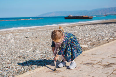 Full length of woman on beach