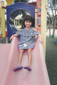 Full length of a girl playing in playground