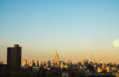 View of cityscape against sky during sunset