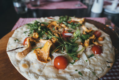 Close-up of pizza served in plate