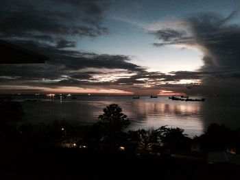 Scenic view of sea against sky at night