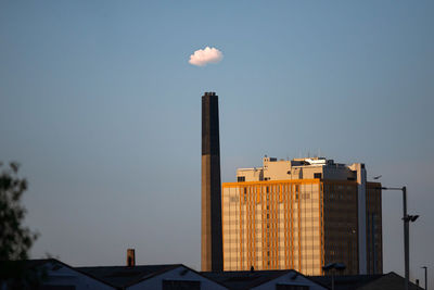 Low angle view of buildings against clear sky