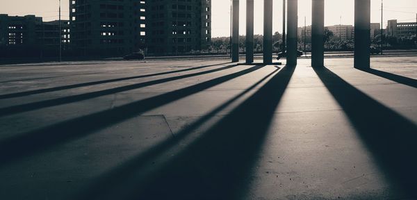 Shadow of building on street in city