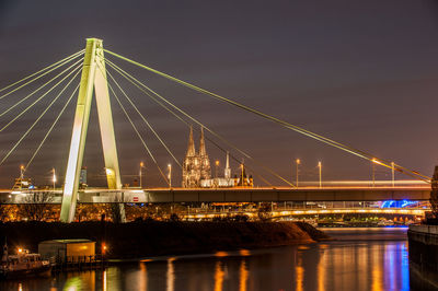 View of suspension bridge at night