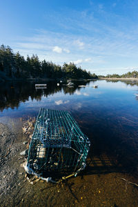 Abandoned lobster traps polluting the shores of cape breton island, gabarus, nova scotia, canada