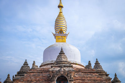 Low angle view of temple building against sky