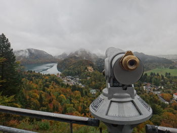 Scenic view of mountains against cloudy sky