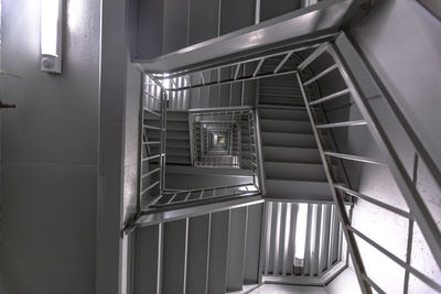 Low angle view of spiral staircase in building