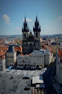 Church of our lady before tyn and cityscape against sky