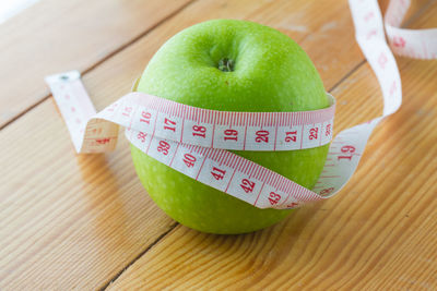 High angle view of apple on table