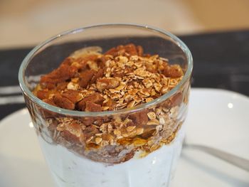 Close-up of breakfast in glass on table