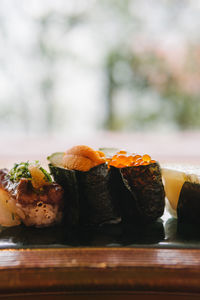 Close-up of sushi in plate on table