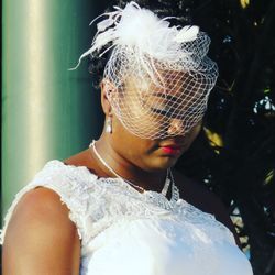 Close-up of young woman in wedding dress