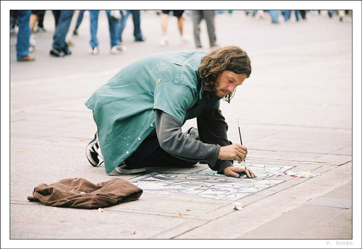 FULL LENGTH OF MAN ON SIDEWALK