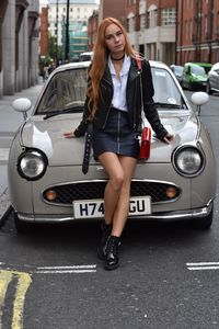 Young woman in car