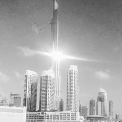 Low angle view of skyscrapers against sky