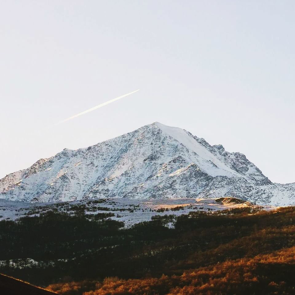 SNOW COVERED MOUNTAIN RANGE