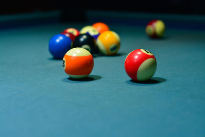 Close-up of multi colored balls on table